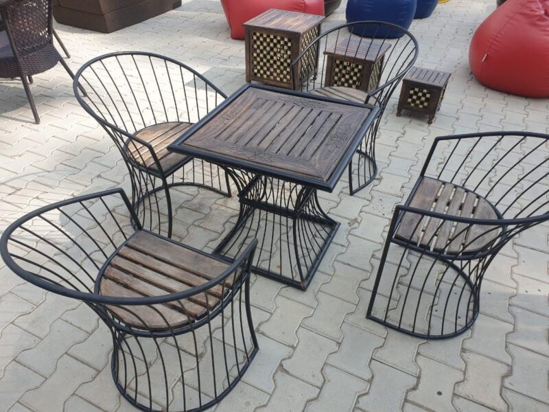 NATURAL ART & CRAFT : "Elevate your outdoor or indoor space with this stylish Wood & Wrought Iron Patio Furniture Set. A perfect blend of durability and elegance in brown and black, offering both comfort and timeless design for any garden or living area."